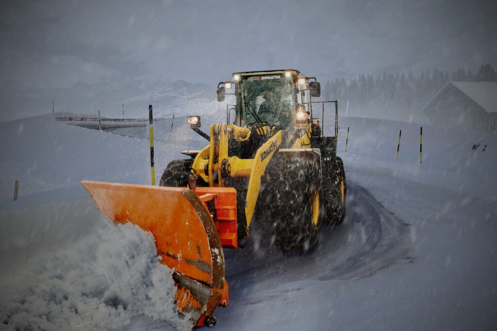 yellow and orange snow plouh