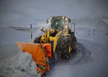 yellow and orange snow plouh